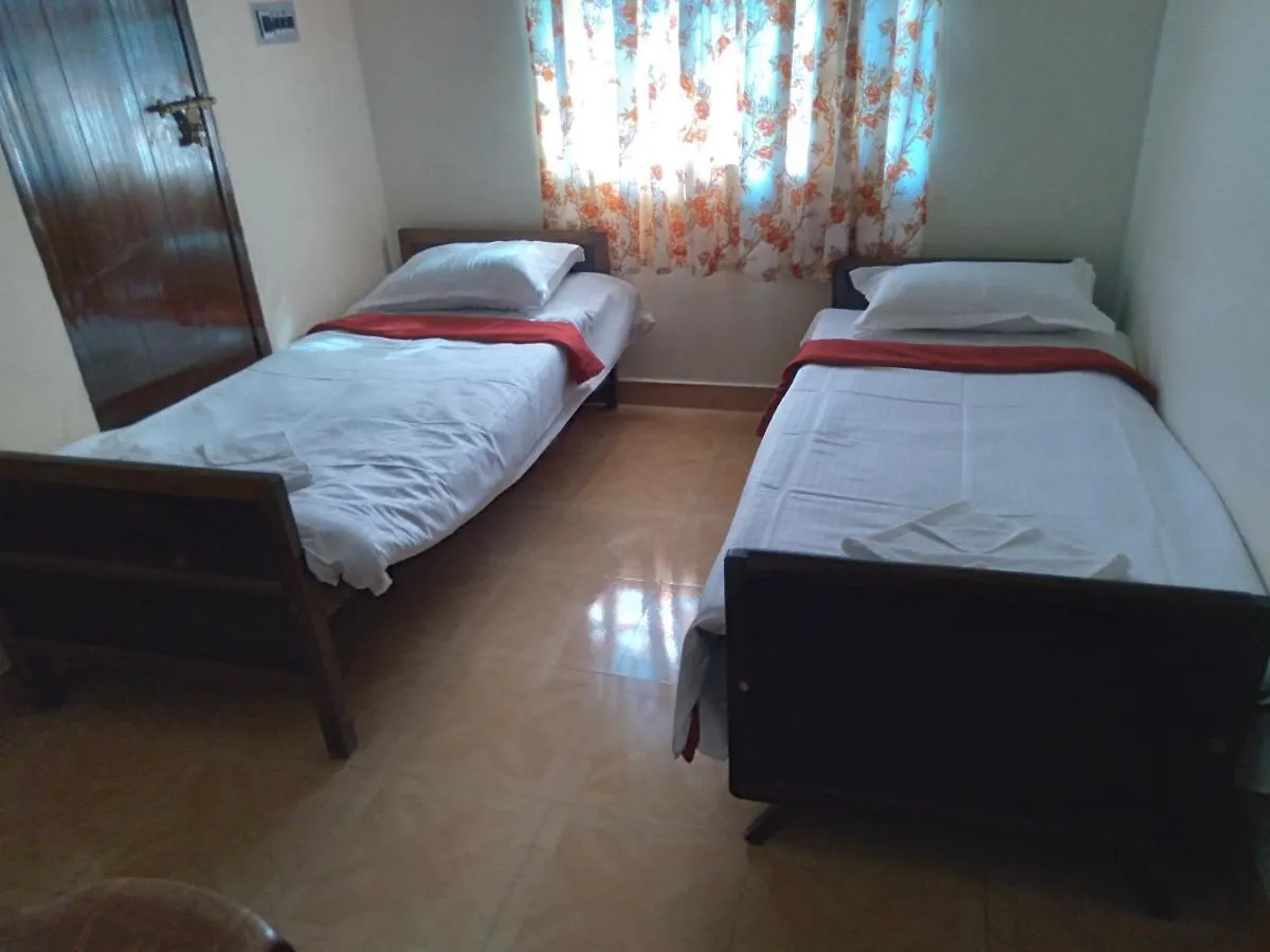 Homely Homestay 칼파타